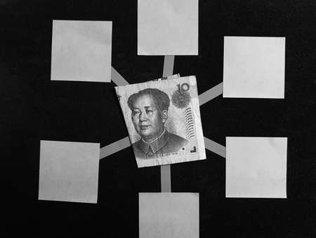 idea of a mind map with a Chinese banknote of ten yuan in the center, black and white imageの写真素材