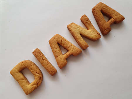 baked biscuits with shape of letters forming the name Dianaの写真素材