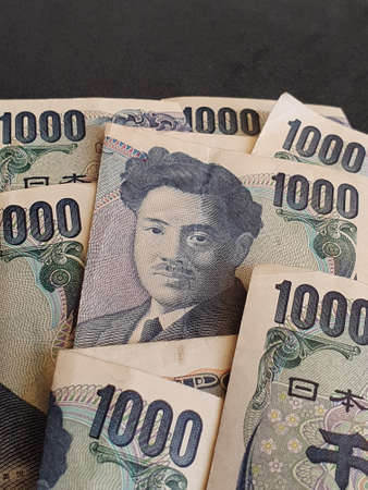 approach to japanese banknotes of 1000 yen, background and textureの写真素材
