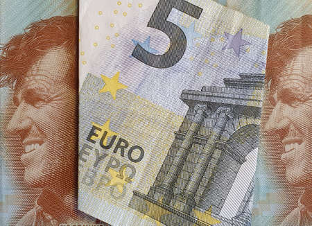 approach to european banknote and New Zealand billsの写真素材