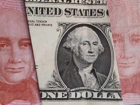 approach to american one dollar bill and Costa Rican banknotes of 1000 colones