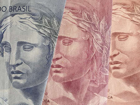 approach to brazilian banknotes of different denominations, background and texture