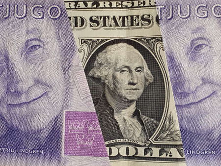 approach to american one dollar bill and swedish banknotes of twenty kronor
