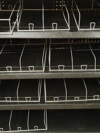 empty shelves in a supermarket for panic purchasesの写真素材