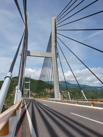 view of a bridge with a hydraulic cable structure on a highwayの写真素材