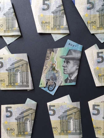 australian banknote of ten dollars and european bills of five euroの写真素材