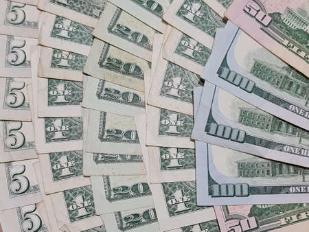 american dollars banknotes of different denomination, background and texture