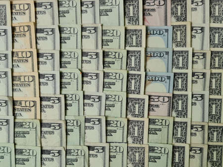 american dollars banknotes of different denomination, background and texture