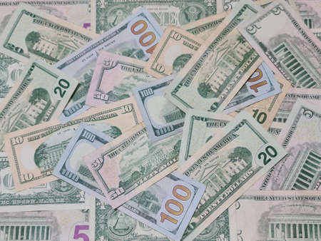 american dollars banknotes of different denomination, background and texture