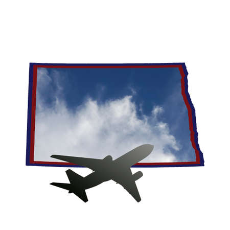 illustration of the silhouette of an airplane on the map of the State of North Dakota with the image of the skyの写真素材