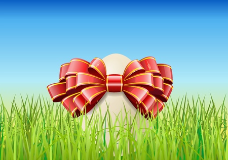 Easter egg and the green grass are shown in the image.のイラスト素材