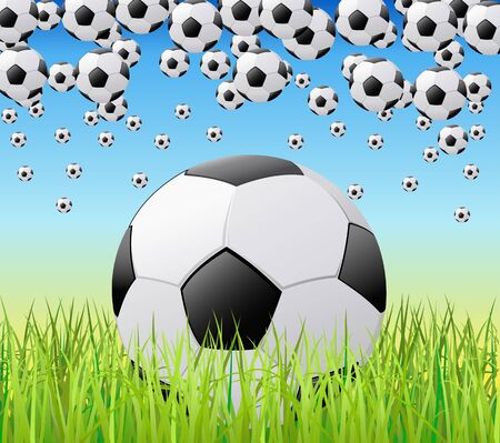 Soccer balls on green grass are shown in the image.のイラスト素材