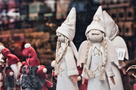 Little angels behind window shopの写真素材