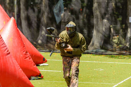 Russia. Stavopol. 07/27/2019 The 5th annual corporate tournament among young specialists of Gazprom employees. Paintball competitions on the sports field with unprofessional amateur teams.のeditorial素材