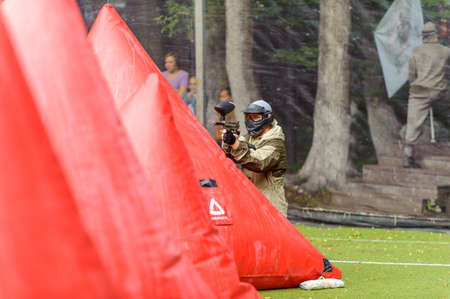 Russia. Stavopol. 07/27/2019 The 5th annual corporate tournament among young specialists of Gazprom employees. Paintball competitions on the sports field with unprofessional amateur teams.のeditorial素材