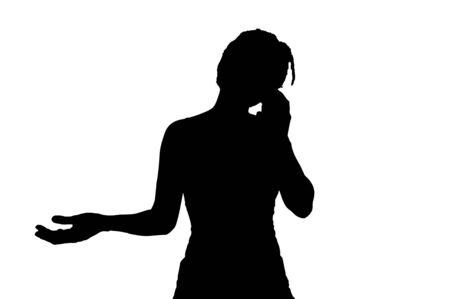 The woman is talking on the cellphoneの写真素材