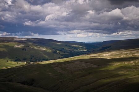 Looking out across a barren Yorkshire landscape under a cloudy sky.