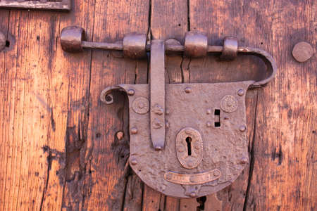Latch or lock old in a colonial house. Candelaria district, Bogotï¿½, Colombia.の写真素材