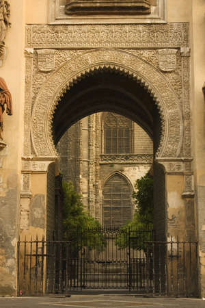 Old Almohad door giving access to the mosque (XII century). Today is part of the cathedral of Seville, Spainの写真素材