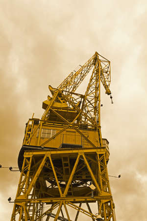 Port crane with dramatic skyの写真素材