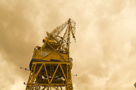 Port crane with dramatic skyの写真素材