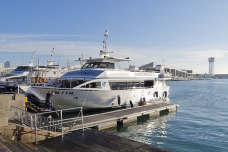 BARCELONA - DEC 20  Typical boat called Golondrinas at harbor in Barcelona, Spain on December 20, 2012  The Golondrinas offer three boat cruises around the Barcelona waterfront のeditorial素材