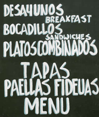 Typical spanish table of Tapas, Paellas, Menuの写真素材