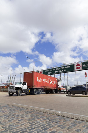URUGUAY - SEPTEMBER 25: A loaded truck leaves Port on September 25, 2012 in Montevideo, Uruguay. It is one of the largest ports of South America and an important transit area for loads of Mercosurのeditorial素材