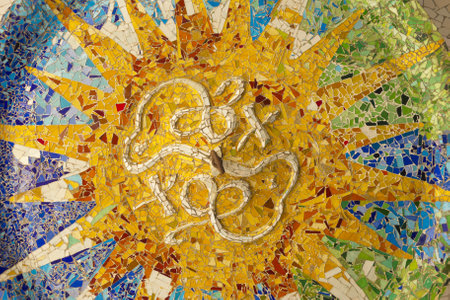 Ceiling with mosaic sun of Park Guell designed by Antonio Gaudi on December 27, 2012 in Barcelona. Part of the UNESCO World Heritage Site Works of Antoni Gaudi.のeditorial素材