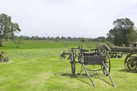 Ancient wooden carriage of a shaftの写真素材
