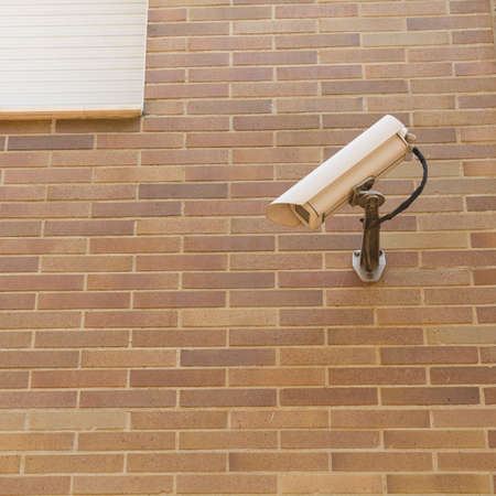security camera on a wallの写真素材