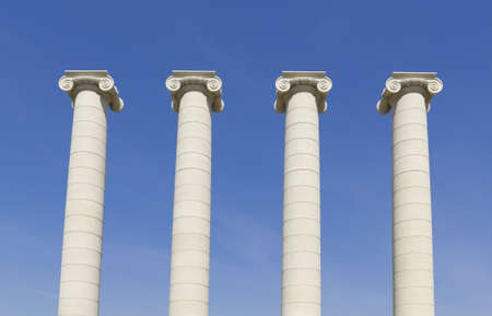 Four white columns near Royal palace  The columns, symbolizing the four stripes of the Catalan flagの写真素材