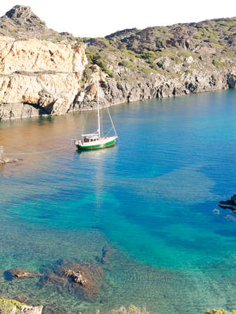 Boats on mediterranean bay. The Cap de Creus, a natural park, is ideal for excursions on foot or by boat. Situated in the northern Costa Brava, Girona province, Catalonia, Spain.の写真素材