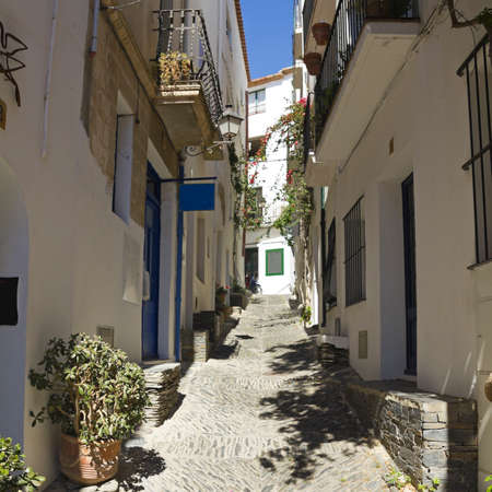 Mediterranean alley, adorned with flowers and plants. Costa Brava, Catalonia, Spain.の写真素材