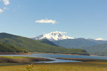 Nalcas National Park, Chile. The Bio Bio river, and in the background snowy volcano Lonquimayの写真素材