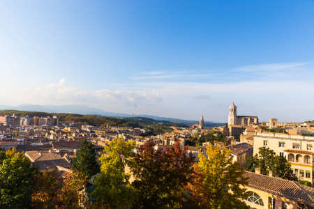 The medieval quarter of Gerona with bell tower of Santa Maria cathedral in background. View from The Forca Vella. Gerona, Costa Brava, Catalonia, Spain.の写真素材