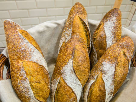 Delicious bread in a basket at a bakery
