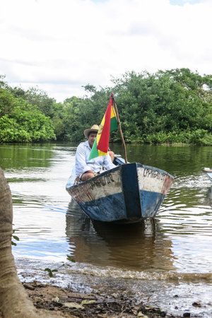 Madidi river - MAY 5: Instant of a boat with people sailing in the river, on May 5, 2015 in Beni Region, Bolivia. The rivers are the main roads in the Amazon jungle.のeditorial素材