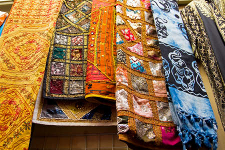Shop with sale of scarves and carpets in the oriental market of the city of Granada. Andalusia, Spain.の写真素材