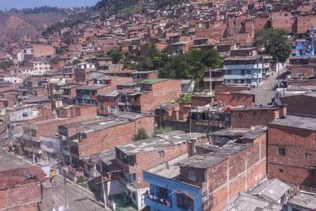 Cityscape of Medellin city, in Antioquia region, Colombia. Shanties built on the slopes of the mountains. Homes townships.の写真素材