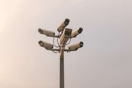 Six cctv security cameras on the street pylon. Security cameras mounting on the high top positionの写真素材
