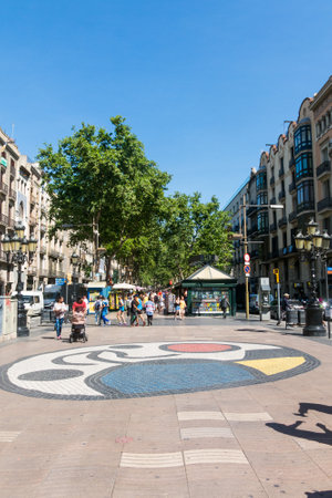 BARCELONA, SPAIN - SEPTEMBER 2: Joan Miro's Pla de l'Os mosaic in La Rambla on September 2, 2017 in Barcelona, Spain. Thousands of people walk daily on the mosaic, designed by famous artist Joan Miroのeditorial素材