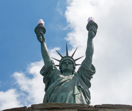 CADAQUES, SPAIN - JUNE 29, 2017: Statue of liberty, bronze. Sculpture inspired by Dalinian by the artist Bartholdi in 1994. Gift of Captain Moore to the municipality of CadaquÃ©s, Spain.のeditorial素材
