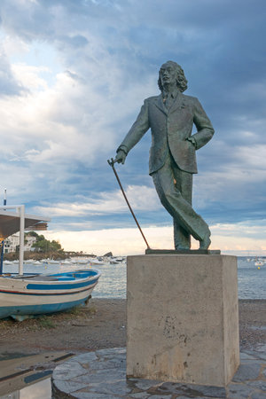 CADAQUES, SPAIN - JUNE 28, 2017: Detail of a bronze life-size statue to famous Salvador Dali in Cadaques, Spain. This small town in the Costa Brava holds the House-Museum of the artistのeditorial素材