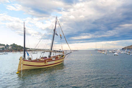 Tourist boat in the port of Cadaques, Costa Brava, province Girona, Catalonia, Spain