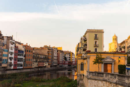 Day view of river Onyar and houses in Girona. In the background, the cathedral. Catalonia, Spainの写真素材