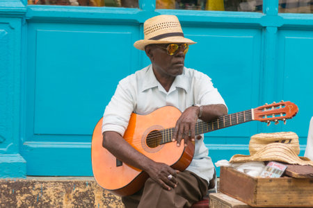 HAVANA, CUBA - JANUARY 16, 2017: Street musician perform for tourists and tips in Old Havana, Havana, Cubaのeditorial素材
