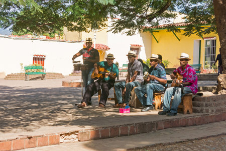 TRINIDAD, CUBA - JANUARY 4, 2017: Afrocuban musicians playing on the street in the old town of Trinidad, Cubaのeditorial素材