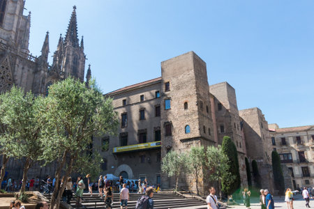 BARCELONA SPAIN - September 2 2017: View of the renovated square of the Cathedral of Barcelona, with the wall and the Roman towers. It is the Gothic cathedral and seat of the Archbishop. Barcelona, Spain.のeditorial素材