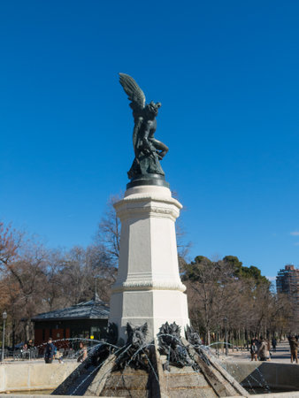 Fountain of Fallen Angel (Fuente del Angel Caido, by Ricardo Bellver, 1877) - highlight of Buen Retiro Park. Buen Retiro Park - Park of Pleasant Retreat - one of largest parks of Madrid City. Spain.のeditorial素材